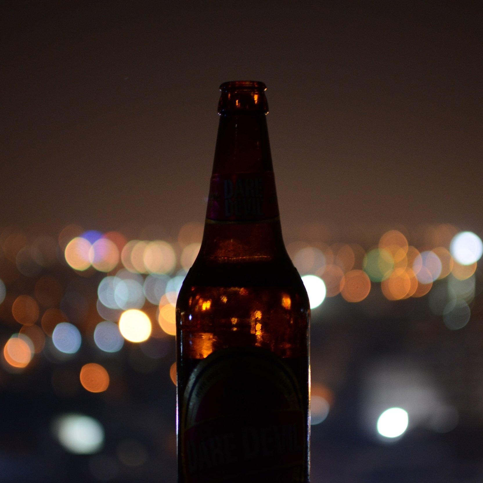 SQ night light bottle sky alcohol drink beer glass bottle city beer bottle photography darkness midnight glass 1616895 copy